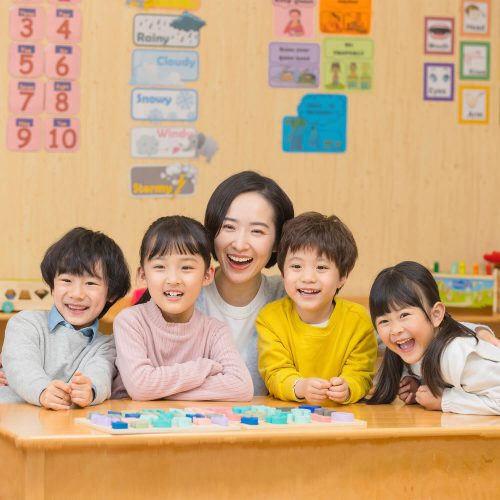 kindergarten-teacher-playing-with-1500 (1)